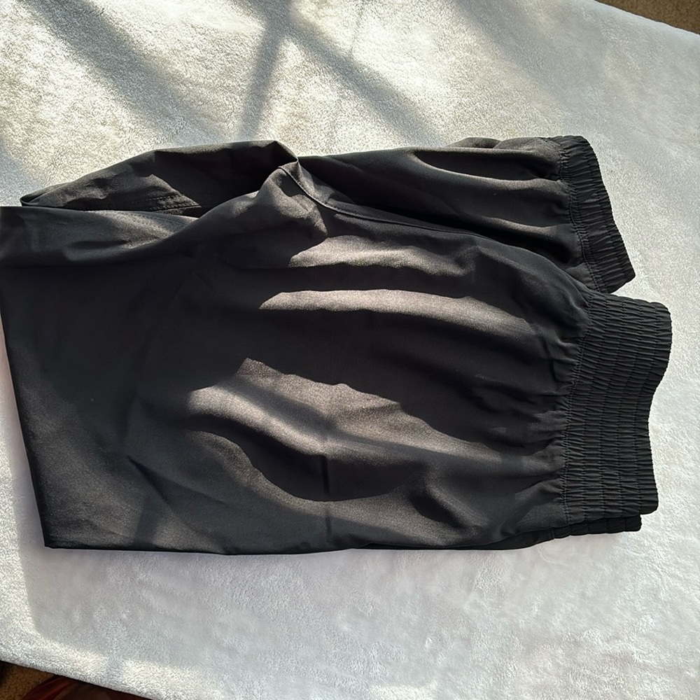 Black unlined track pants